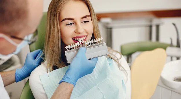 beautiful girl sitting dentist office.